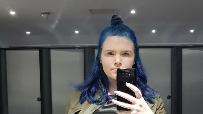 Blue toilet selfie